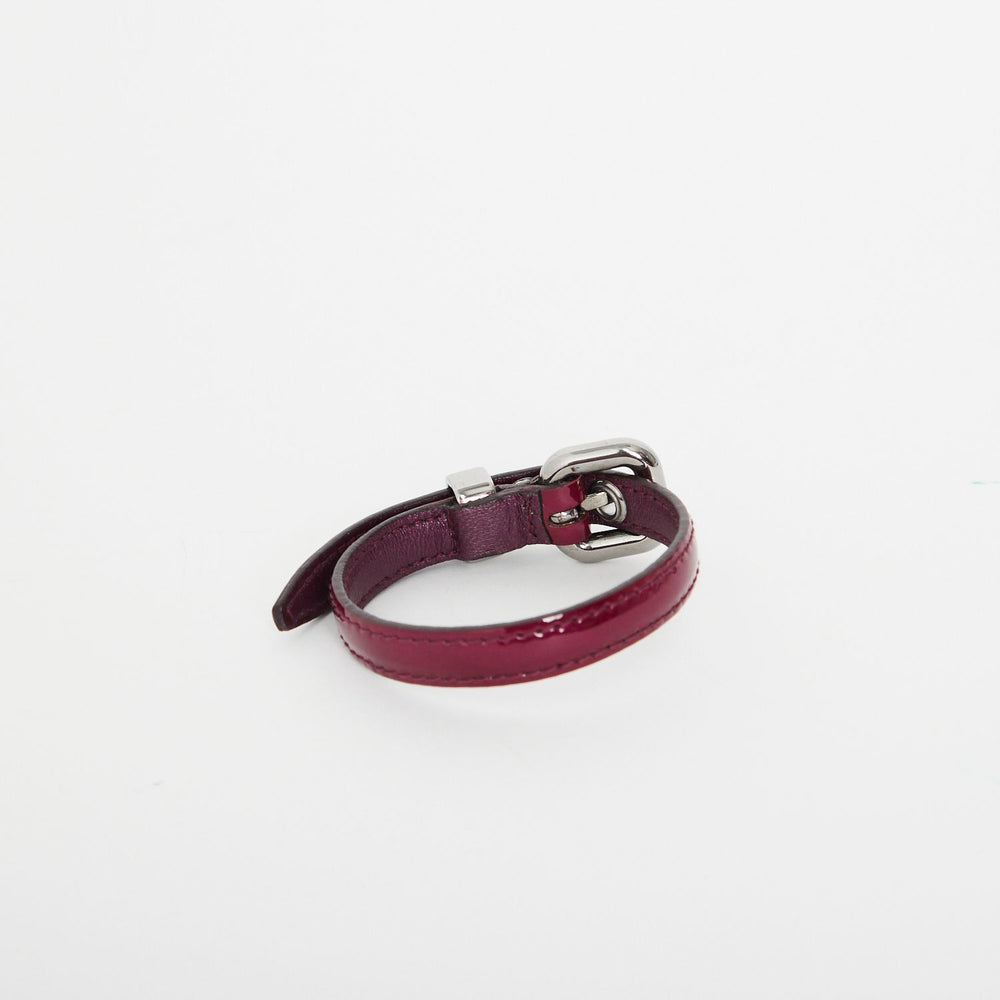 
            
                Load image into Gallery viewer, Miu Miu Patent Bracelet With Logo Charm (Ruby)
            
        