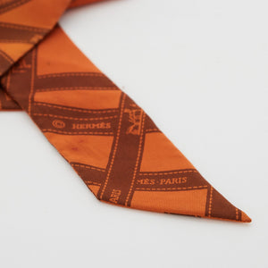 Hermes Silk "Medor Bolduc Twilly Hermes Orange Silk Twilly"