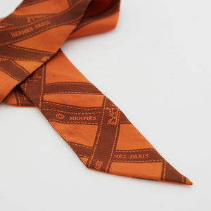 Hermes Silk "Medor Bolduc Twilly Hermes Orange Silk Twilly"