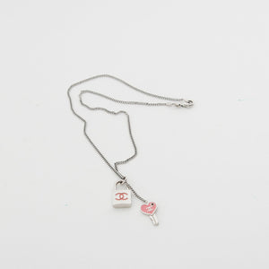 
            
                Load image into Gallery viewer, Chanel lock and key enamel necklace
            
        
